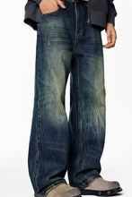 Men’s washed blue denim wide leg jeans plus size with distressed details suitable for casual wear