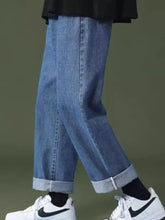Men’s full size wash light-wash denim wide leg jeans with relaxed straight-leg cut and rolled cuffs