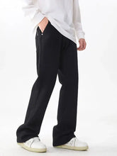 Men’s full size wash wide leg relaxed fit black trousers with sleek straight cut silhouette and subtle side zippers