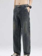 Men’s full size washed relaxed fit jeans in dark-wash denim with straight-leg cut and subtle fading for a worn-in look