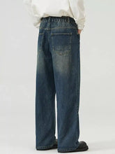 Men’s full size washed straight jeans in faded blue denim with wide-leg cut and elastic waistband for comfort
