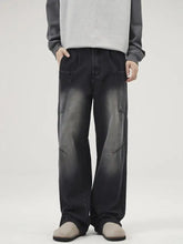 Men’s black denim washed wide leg baggy jeans with a faded distressed look and large cargo pockets plus size