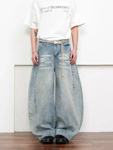 Men’s light-wash denim washed wide-leg jeans with belted waist and frayed hem in full plus size range