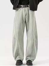 Men’s full size washed light-wash denim wide leg jeans with relaxed cut and visible stitching details