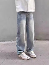 Men’s full size washed wide-leg jeans in light-wash denim with relaxed straight leg and subtle fading