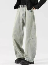 Men’s full size washed light-wash denim wide leg jeans with relaxed cut and visible stitching details