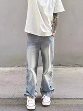 Men’s full size light-wash denim jeans with washed wide leg, relaxed straight cut, and frayed hems plus size