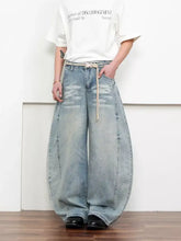 Men’s full size light-wash denim wide-leg jeans with drawstring waistband and subtle fading washed wide-leg style