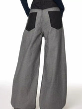 Men’s full size wide leg gray denim jeans with contrasting black patch pockets and button fly closure