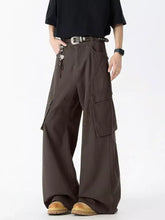 Men’s dark brown wide leg cargo jeans with multiple large pockets in plus size for relaxed fit and durability