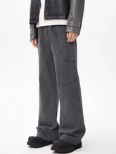 Men’s full size wide leg cargo jeans in dark gray denim with patch pockets and a relaxed straight-cut silhouette