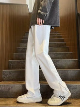 Men’s white wide-leg casual jeans with relaxed fit and subtle side zippers in plus size for comfort and style