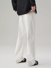 Men’s full size white wide leg casual jeans with a clean minimalist design and subtle front pockets