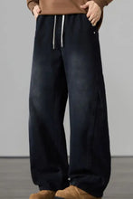 Men’s dark blue wide leg drawstring jeans made of cotton with white drawstrings and side pockets plus size