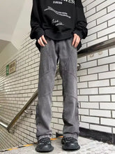 Men’s gray denim wide leg jeans with reinforced stitching and patchwork design in plus size full length style