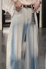Men’s full size wide-leg jeans with high-waisted gradient fade from light blue to white in smooth flowing fabric perfect fit
