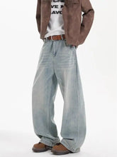 Men’s light-wash denim full size wide leg jeans with relaxed fit and subtle fading for plus size wear