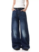 Men’s full size wide-leg jeans in dark blue denim with faded wash and subtle whiskering details