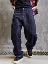 Men’s full size wide leg jeans in dark indigo denim with relaxed wide leg cut and visible stitching details