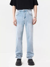Men’s full size wide leg jeans in light-wash denim with straight-leg cut and classic five-pocket design