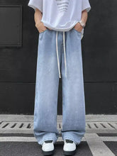 Men’s full size wide leg jeans in light-wash denim with white drawstrings for plus size comfort and style