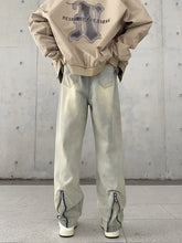Beige bomber jacket with gray graphic on back paired with men’s full size wide leg jeans for plus size men