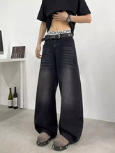 Men’s full size wide leg jeans in black denim with faded distressed look and subtle horizontal stitching details for perfect fit