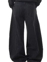 Men’s full size wide leg jeans in black premium cotton with relaxed oversized fit and classic back pockets shown from back side