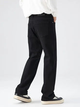 Men’s full size wide leg black denim jeans with classic five-pocket design and subtle stitching details