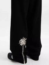 Men’s full size wide leg jeans in black with delicate white palm tree embroidery along the outer seam
