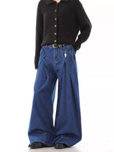 Men’s full size wide leg jeans in blue denim with relaxed pleated design and classic five-pocket style