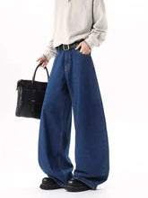 Men’s full size wide leg jeans in blue denim with a relaxed straight-cut silhouette for size wide leg fit