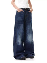 Men’s full size wide-leg jeans in dark indigo denim with faded distressing and black belt loops