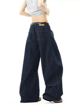 Men’s dark indigo full size wide leg jeans offer a relaxed oversized fit with classic back pockets visible from the back side