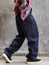 Men’s dark indigo denim wide leg jeans with relaxed fit and visible stitching in full size wide leg plus size style