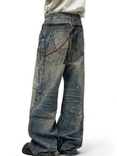 Men’s full size wide leg jeans in faded blue denim with distressed details red stitching and turquoise beads on back side