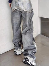 Men’s distressed gray denim wide leg jeans with frayed ripped details on back pockets and sides full size plus size