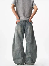 Men’s full size wide leg jeans in faded gray wash denim with a relaxed baggy fit and wide leg design