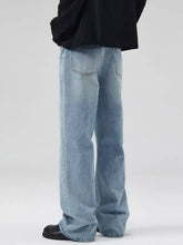 Men’s plus size jeans plus size in light-wash denim with a relaxed wide-leg cut for comfortable wear