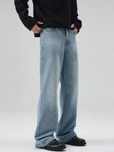 Men’s light-wash jeans plus size with relaxed wide-leg cut and subtle fading for a casual modern look