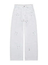 Men’s plus size white denim wide leg jeans with distressed paint-splatter design in premium cotton