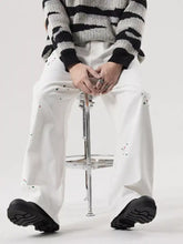 Men’s plus size wide leg jeans in white paint splattered premium cotton with a relaxed fit