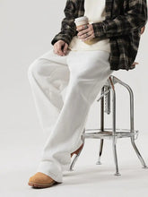 Men’s full size wide leg white trousers with relaxed fit and subtle side seam detailing in denim material