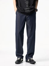 Men’s full size wide leg dark blue denim jeans with straight-leg cut and visible stitching details