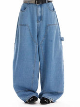 Men’s full size wide leg jeans in light-wash blue denim with a relaxed fit and visible stitching details including pockets