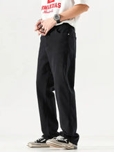 Men’s black straight-leg denim wide leg jeans with relaxed fit subtle stitching plus size with pockets