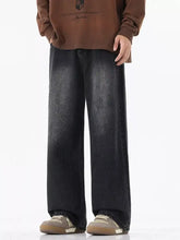 Men’s dark-wash denim relaxed fit jeans with a wide-leg cut and frayed hems for plus size fit jeans