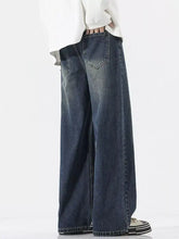 Men’s full size dark blue wide-leg denim jeans with faded wash and classic stitching relaxed fit jeans