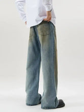 Men’s full size wide leg relaxed fit jeans in denim with a faded gradient wash from light blue to olive green