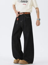 Men’s full size black wide leg denim jeans with white stitching and classic five-pocket design for wide leg wash style